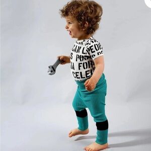 Vibrant Teal and Black Kids Leggings by boutique label, Wolf and Rita